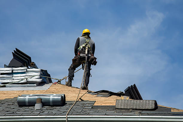 Professional Roof Replacement technician working in Minotola, NJ
